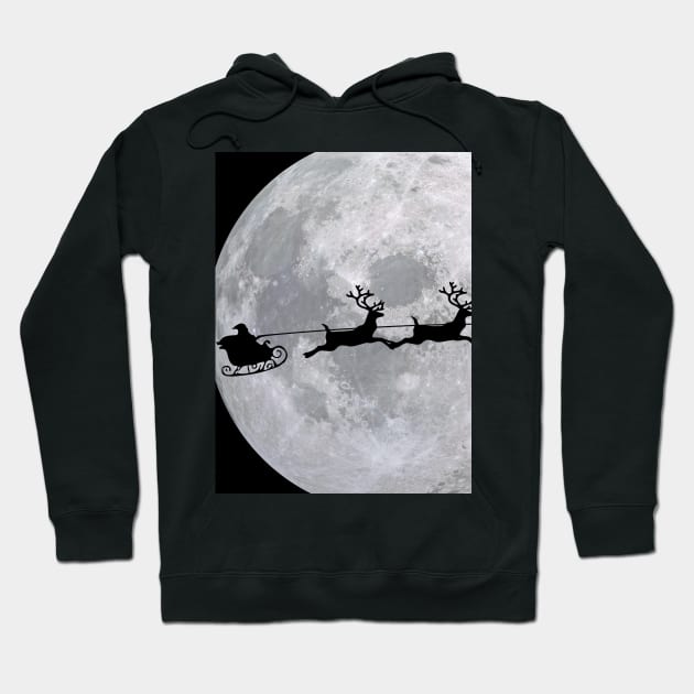 Santa and his sleigh flying across the moon at Christmas time! Hoodie by mazdesigns